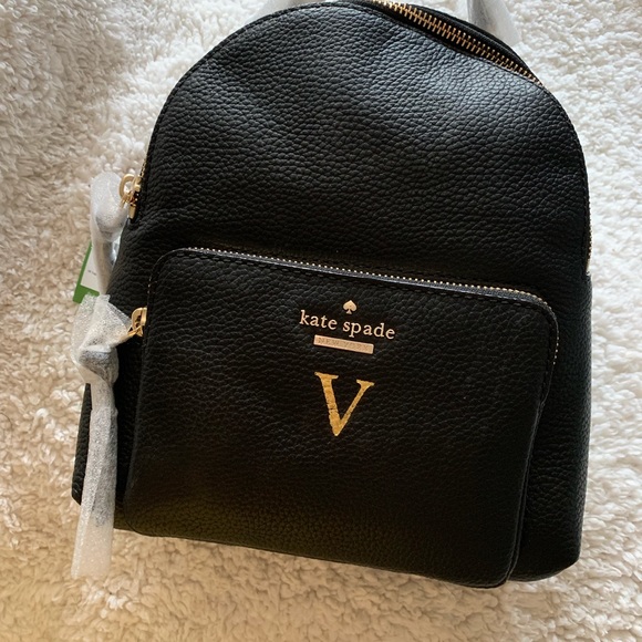 black custom mini prospect backpack Laptop | Corporate Merch It holds exactly what OKUMA SST-S-962MLa SST Cork Color:Matte Black / Gold pattern:solid